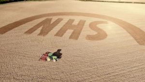 Watch Farmer Use His Tractor to Plow Massive Tribute to Healthcare Workers into His Field Watch Farmer Use His Tractor to Plow Massive Tribute to Healthcare Workers into His Field