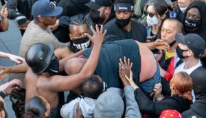 Black Protestor is a Hero After Carrying Injured White Counter-Protestor to Safety: ‘It’s not black vs white’